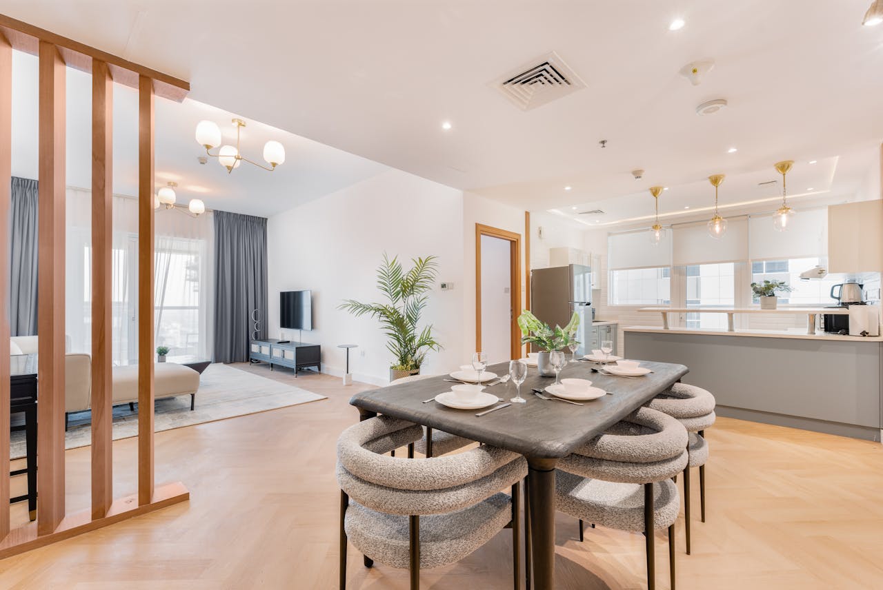 Bright and stylish open-concept dining and living area with contemporary decor.
